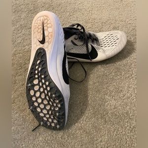 Men’s Nike track shoes.